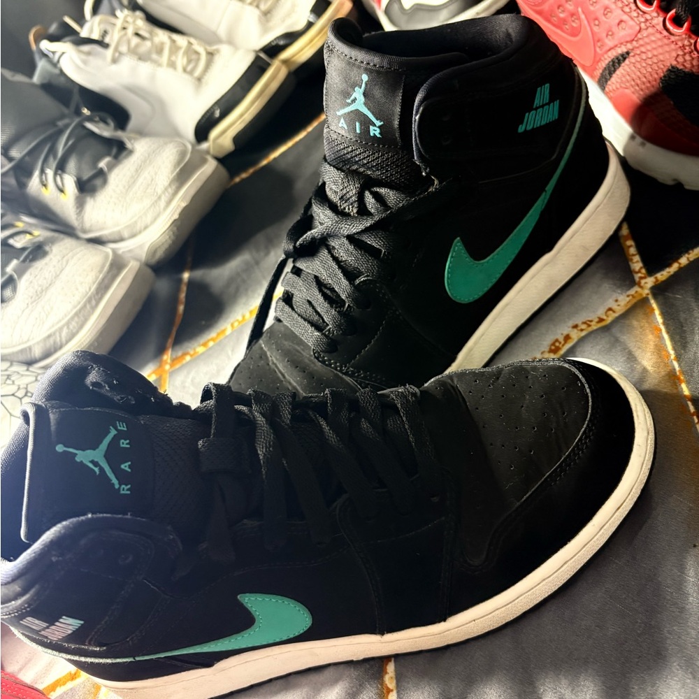 Jordan Black High-Top Sneakers with Teal Swoosh